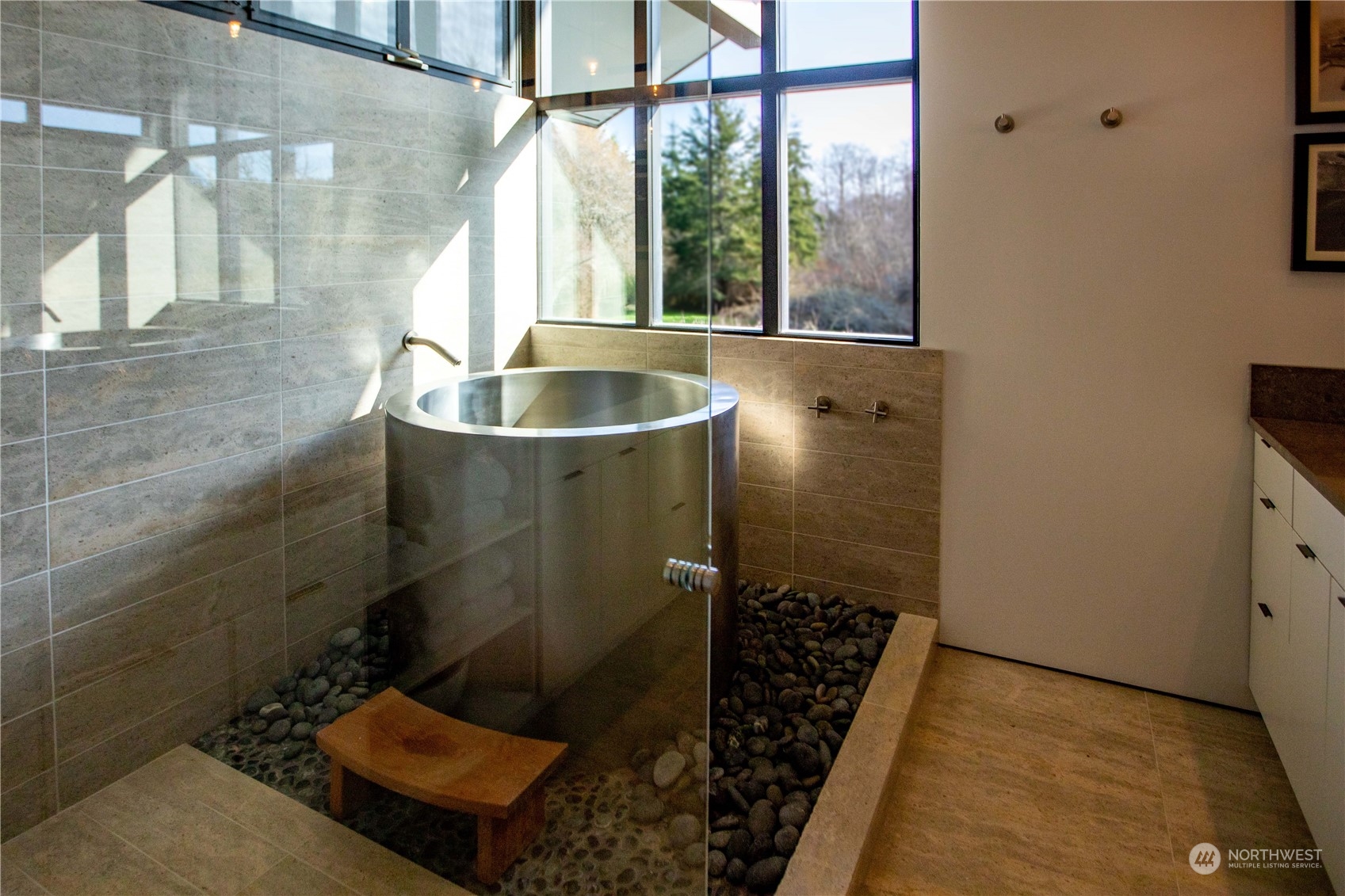 265 Rainshadow Road San Juan Island, WA 98250 - Photo 27 of 40 a bathroom with a shower and a sink
