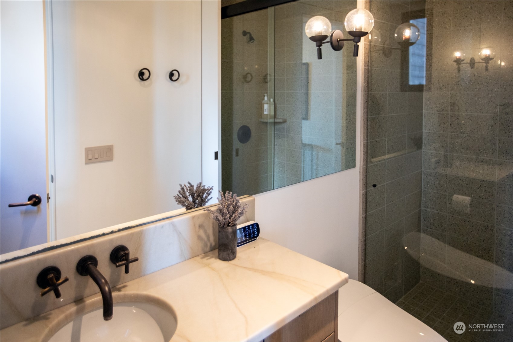 265 Rainshadow Road San Juan Island, WA 98250 - Photo 32 of 40 a bathroom with a tub sink and mirror