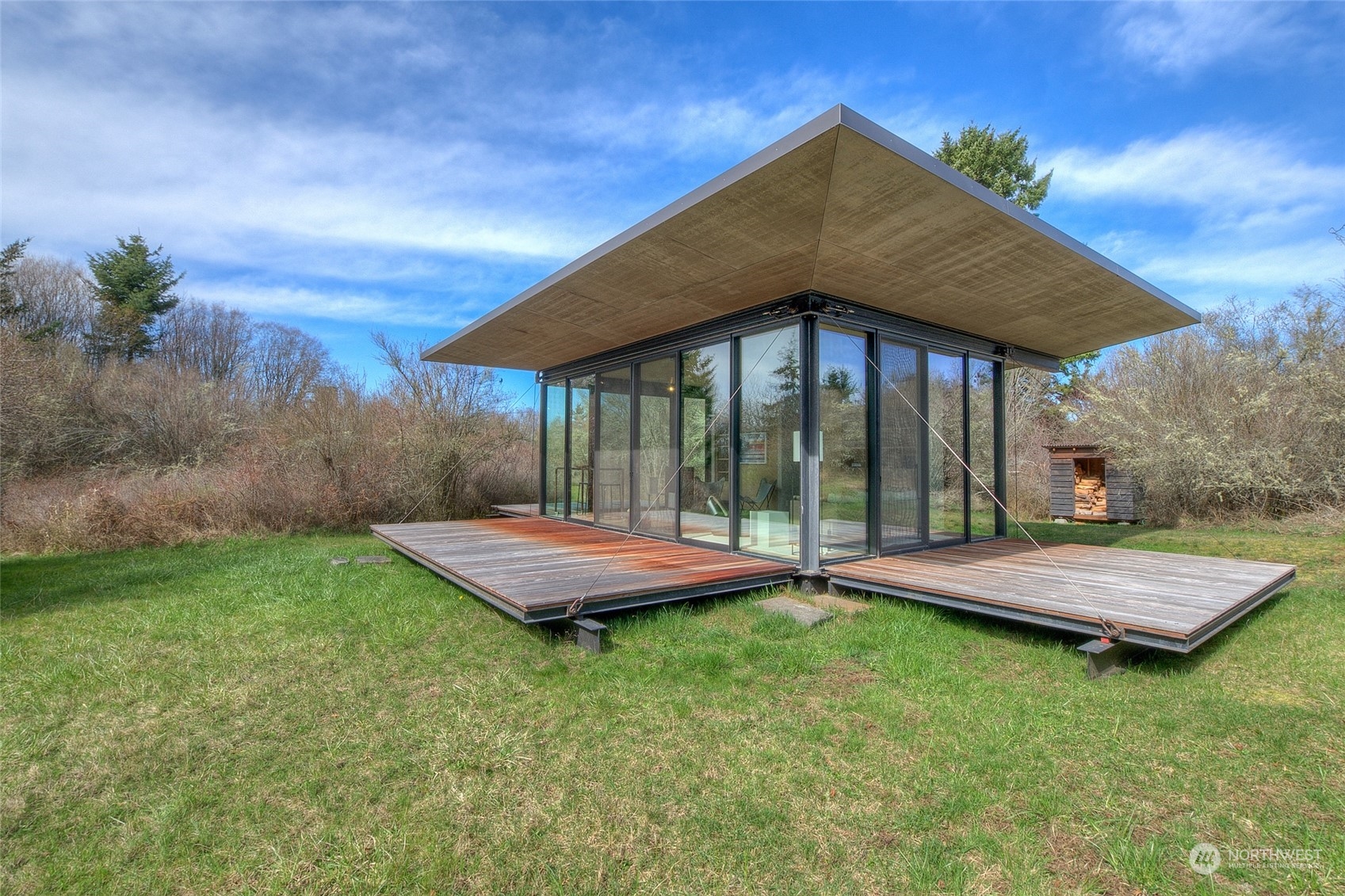 265 Rainshadow Road San Juan Island, WA 98250 - Photo 34 of 40 a front view of a house with garden