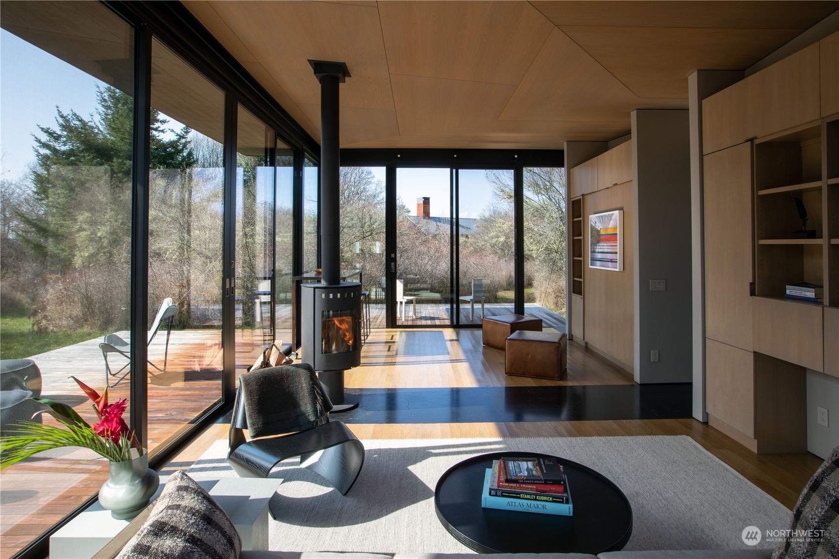 265 Rainshadow Road San Juan Island, WA 98250 - Photo 37 of 40 a living room with couch and a floor to ceiling window