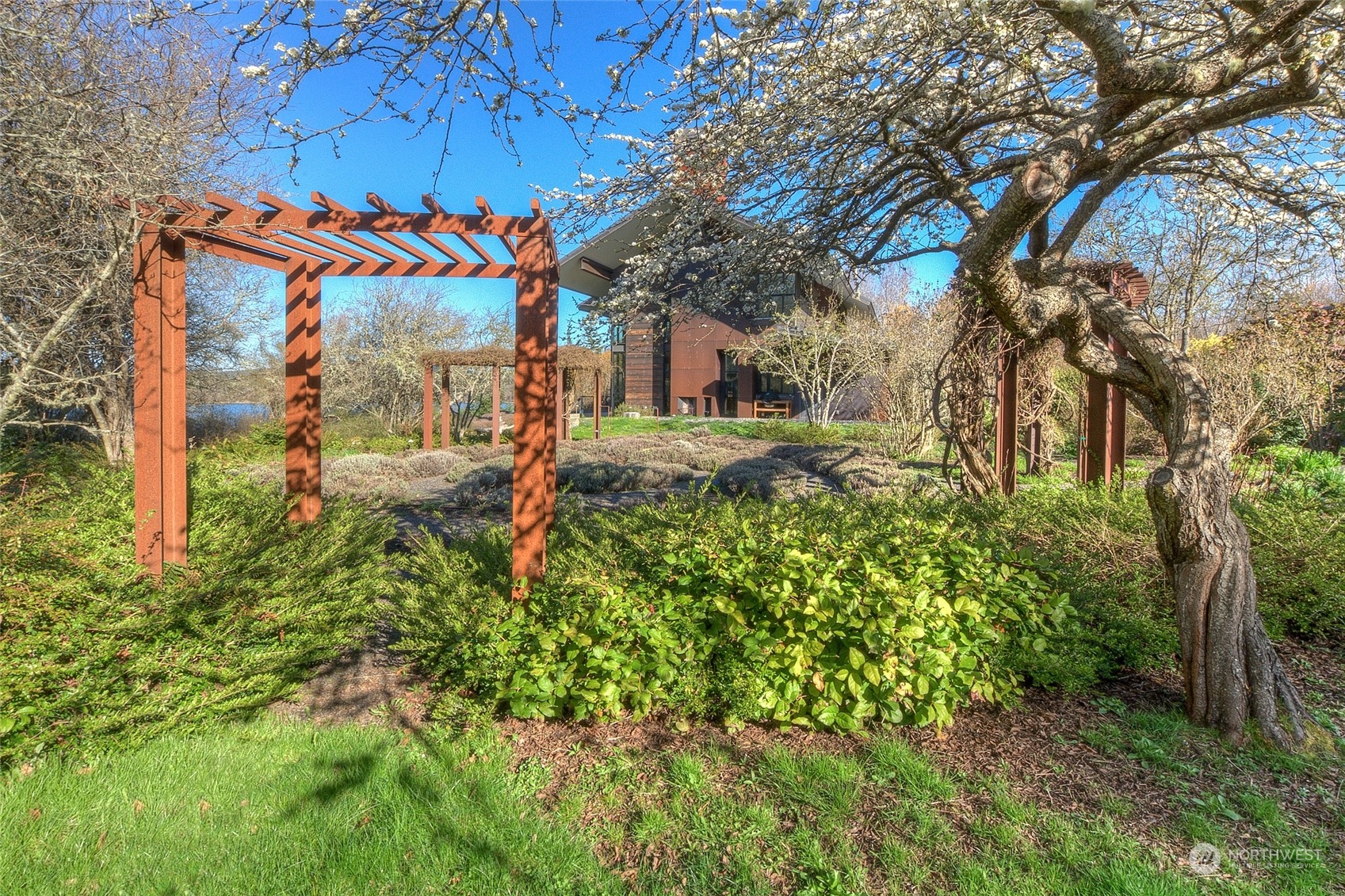 265 Rainshadow Road San Juan Island, WA 98250 - Photo 7 of 40 a backyard of a house with lots of green space