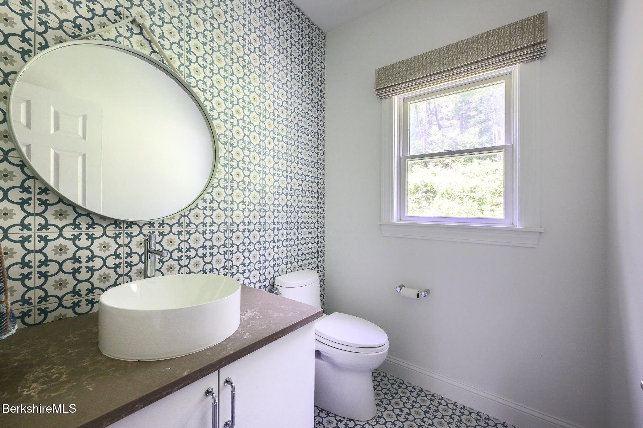 50 Old Village Road Alford, MA 01230 - Photo 16 of 66 a bathroom with a toilet a sink and mirror