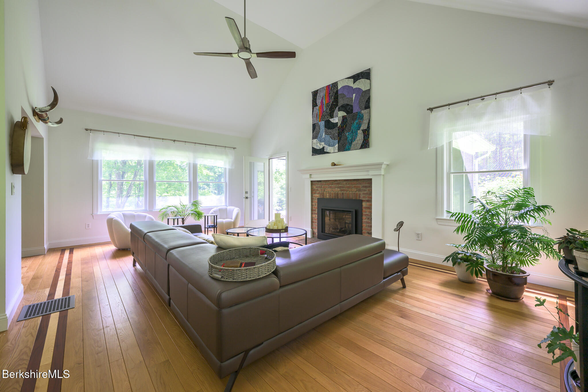 50 Old Village Road Alford, MA 01230 - Photo 28 of 66 a living room with furniture and a fireplace