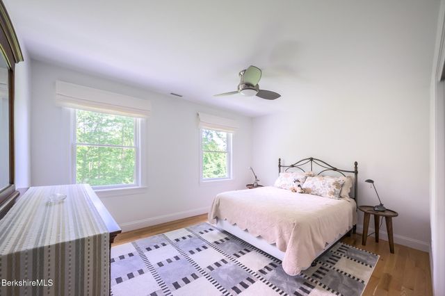 a room with furniture and a wooden floor