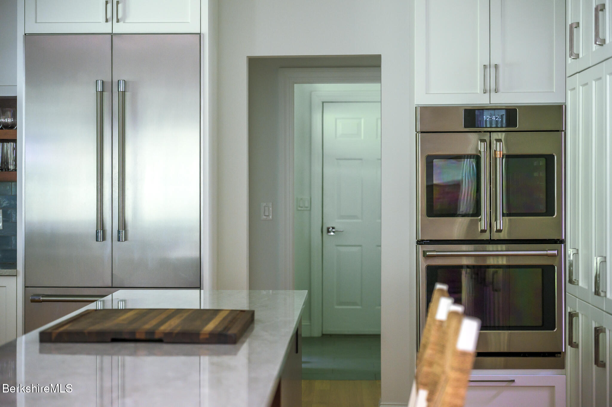 50 Old Village Road Alford, MA 01230 - Photo 52 of 66 a kitchen with granite countertop a refrigerator and a sink