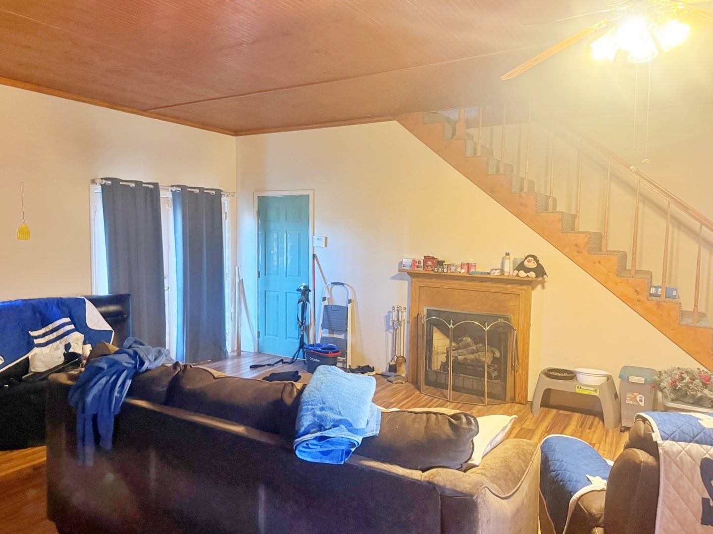 3675 Macedonia Road Metropolis, IL 62960 - Photo 22 of 50 a living room with furniture a large window and a wooden floor