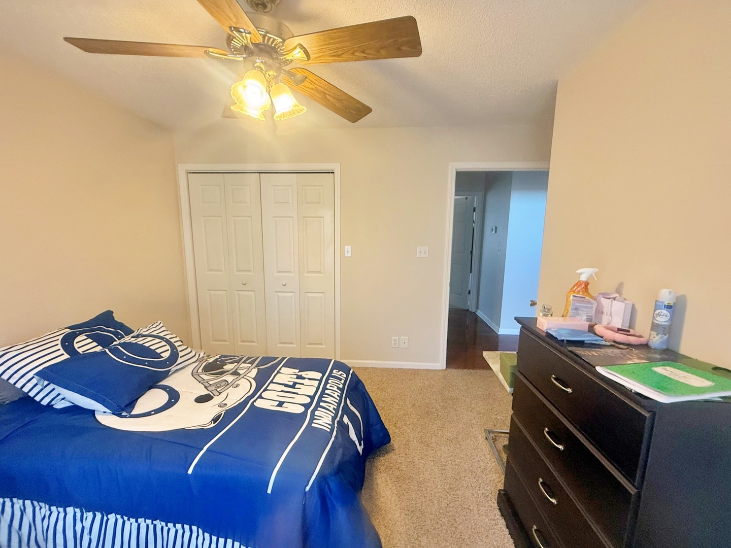 3675 Macedonia Road Metropolis, IL 62960 - Photo 40 of 50 a bedroom with a bed and a chandelier