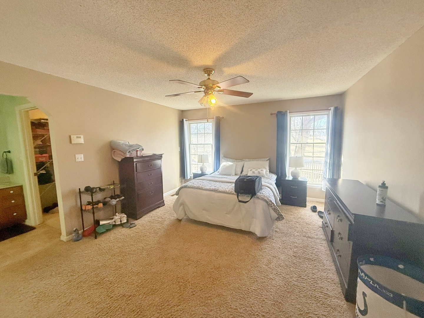 3675 Macedonia Road Metropolis, IL 62960 - Photo 45 of 50 a spacious bedroom with a bed and furniture