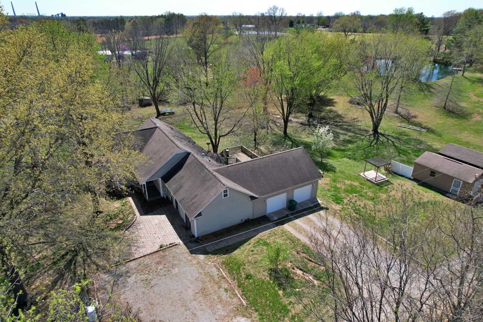 3675 Macedonia Road Metropolis, IL 62960 - Photo 6 of 50 a view of a two chairs in a backyard