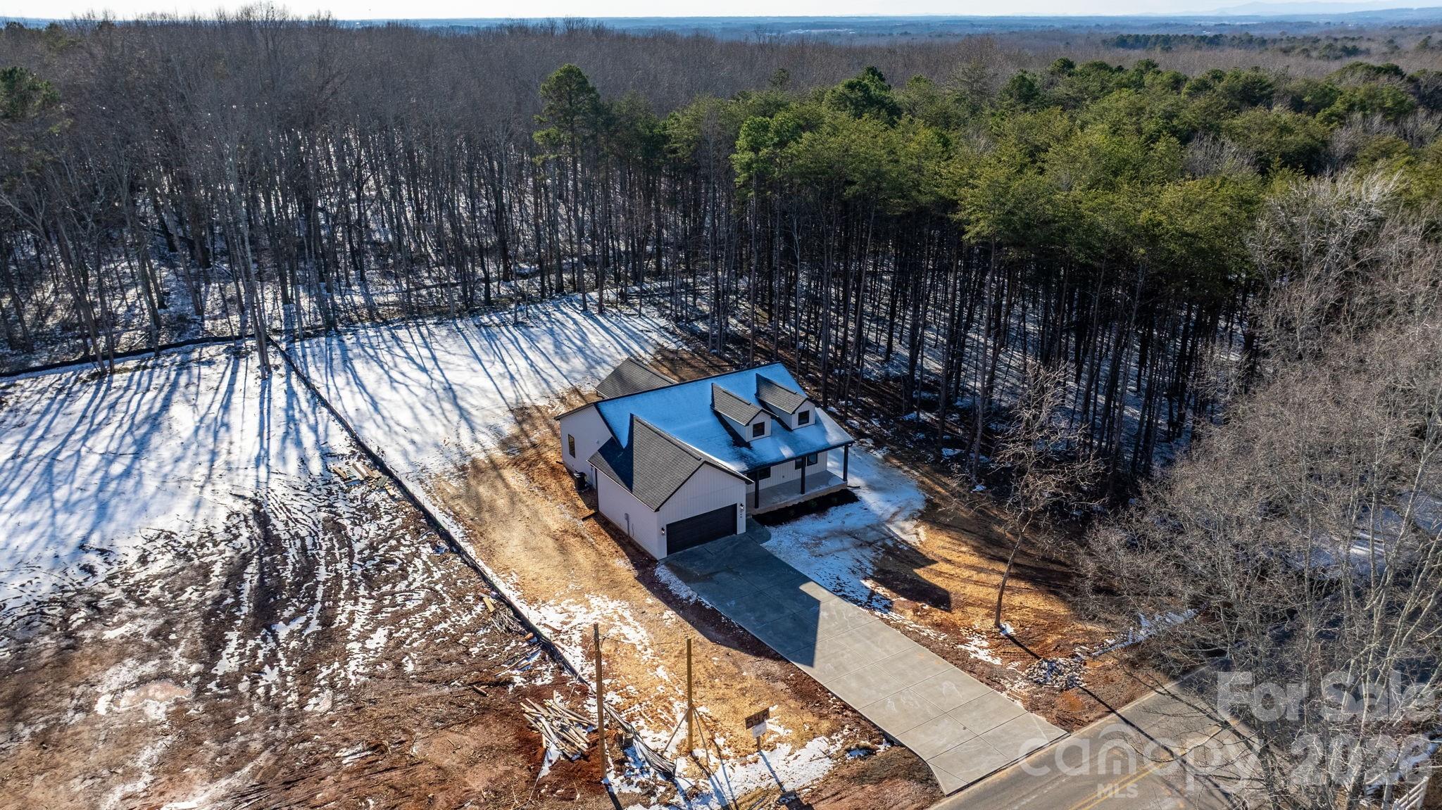548 Car Farm Road Lincolnton, NC 28092 - Photo 2 of 41 a view of a backyard with pathway