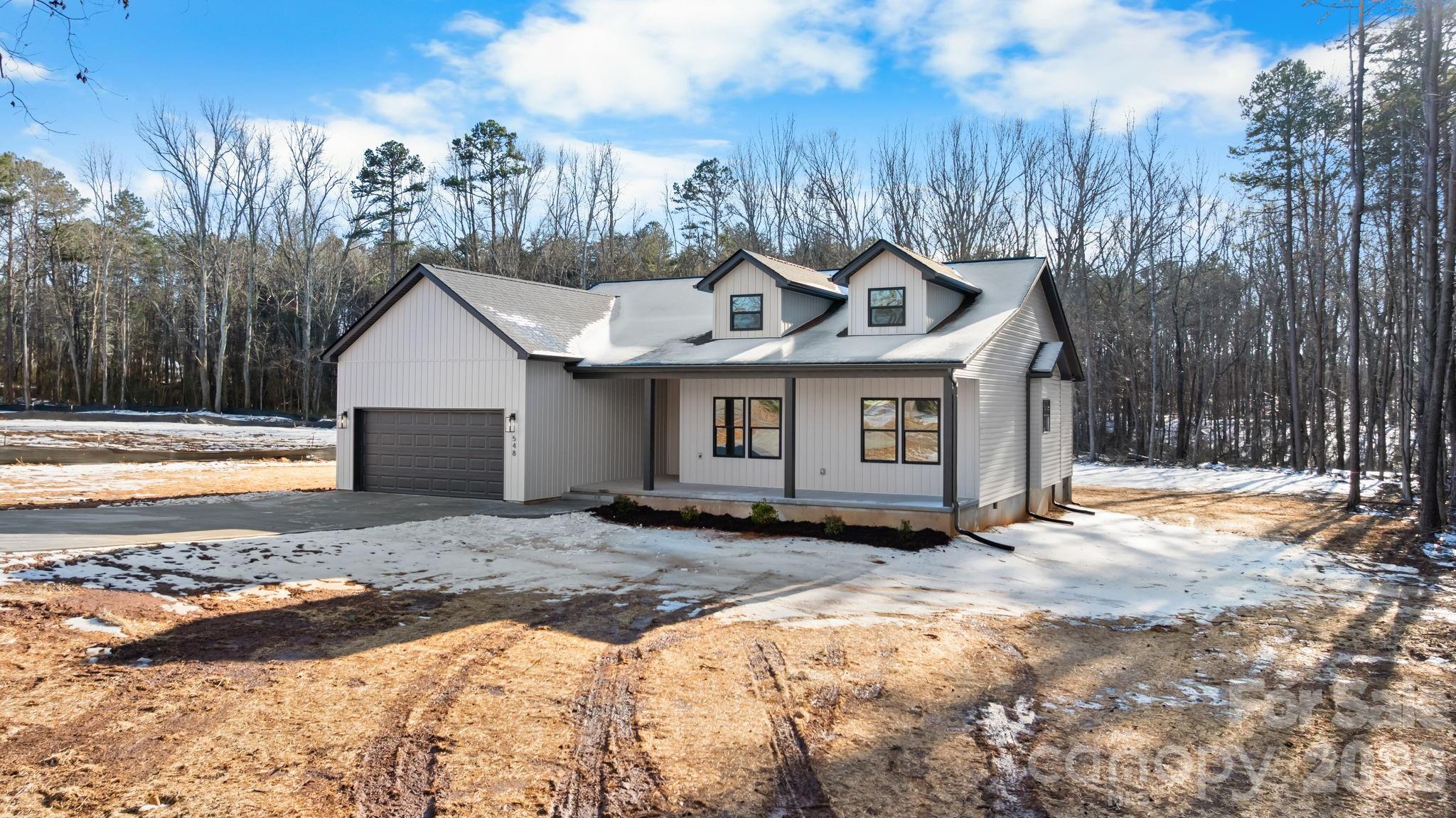 548 Car Farm Road Lincolnton, NC 28092 - Photo 29 of 41 a view of a house with a yard covered in snow