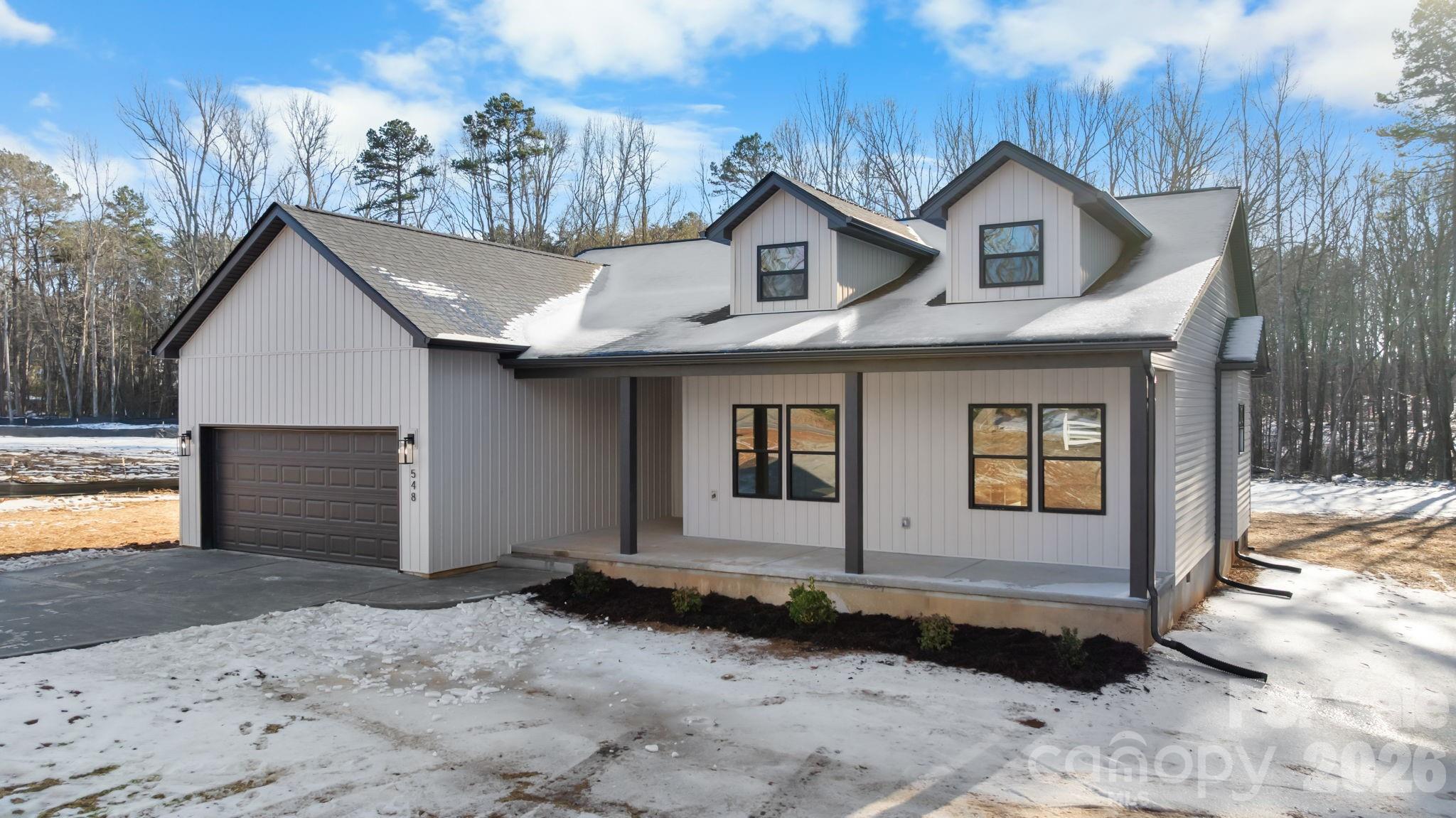 548 Car Farm Road Lincolnton, NC 28092 - Photo 30 of 41 a front view of a house with a yard and garage