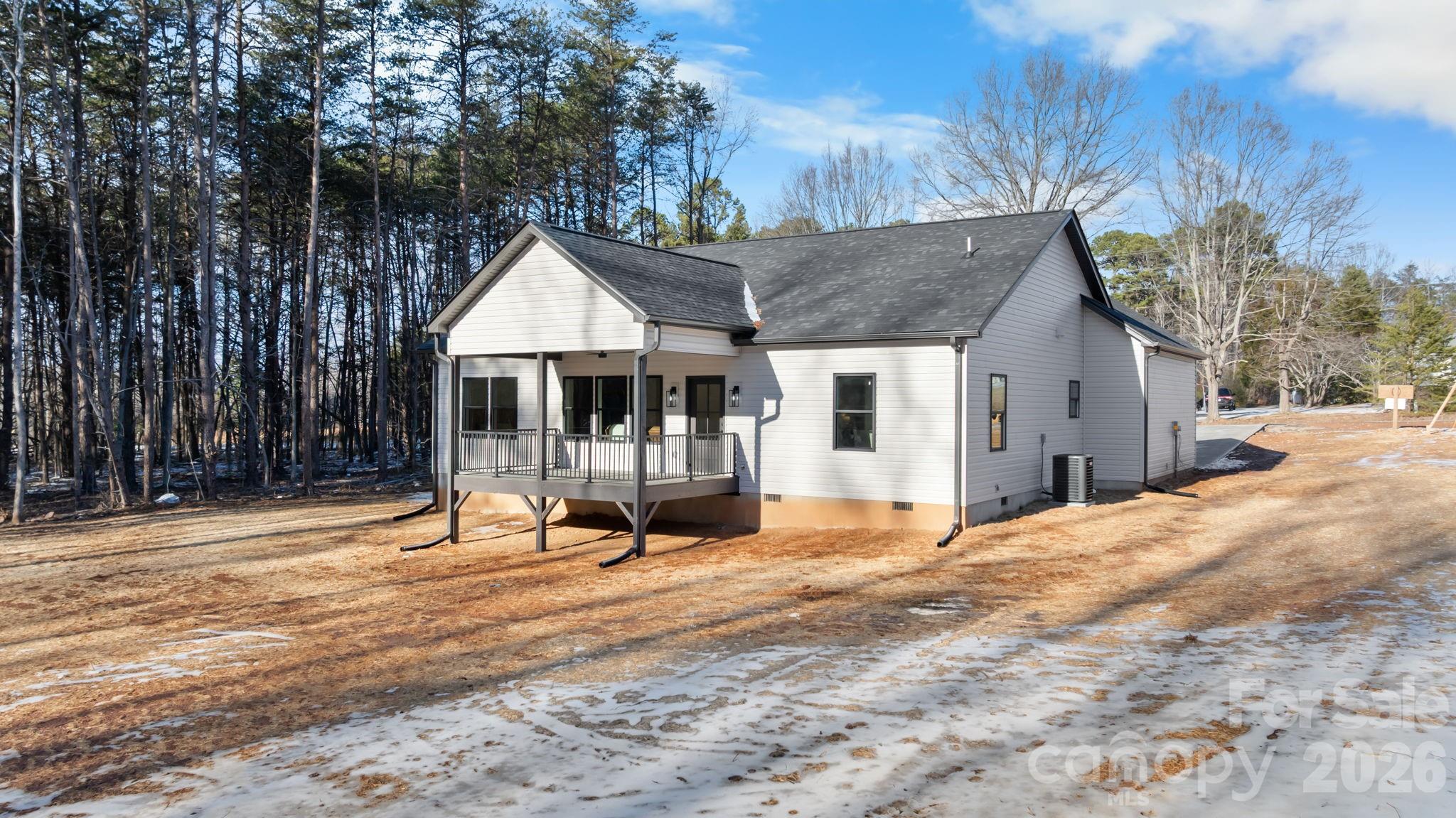 548 Car Farm Road Lincolnton, NC 28092 - Photo 33 of 41 a view of a house with backyard and sitting area