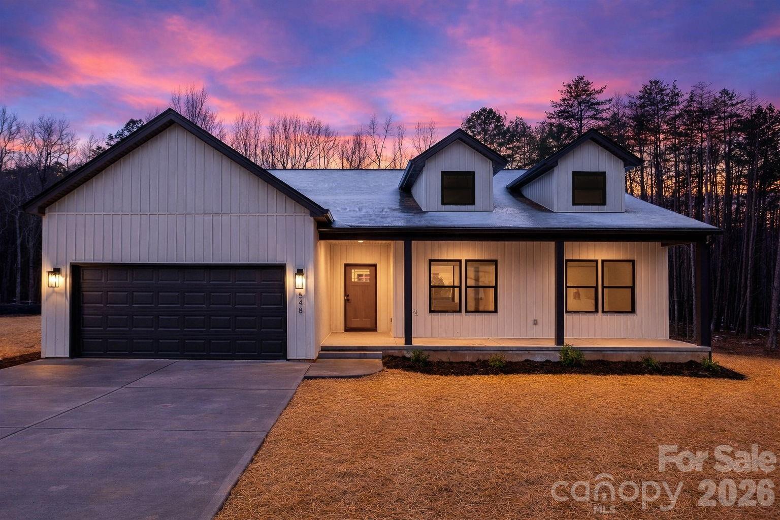 548 Car Farm Road Lincolnton, NC 28092 - Photo 40 of 41 a front view of a house with a yard and garage