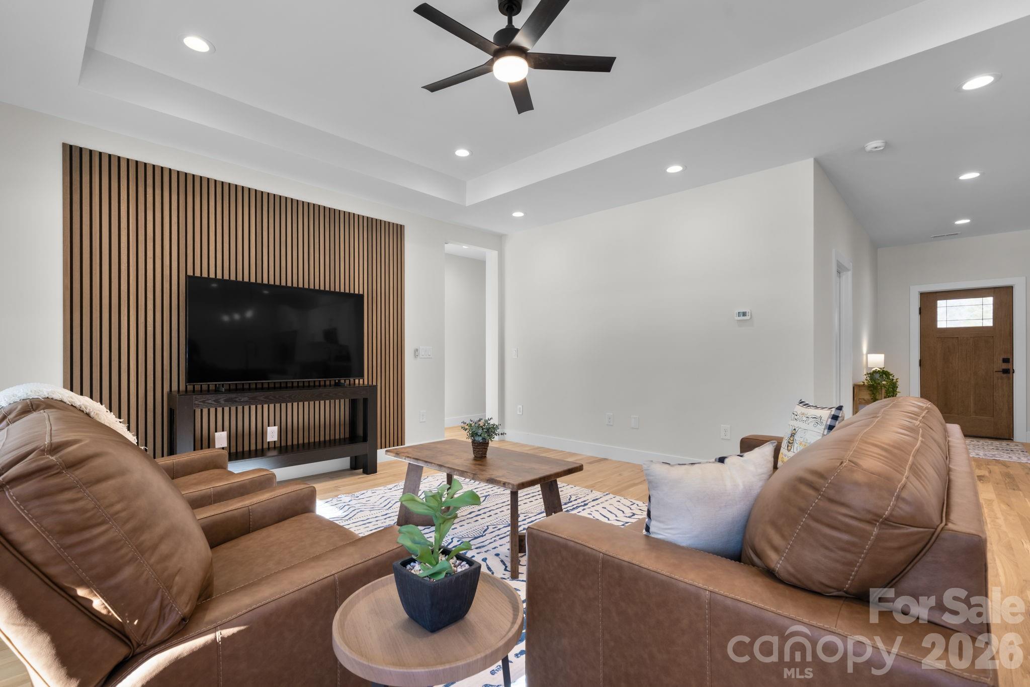 548 Car Farm Road Lincolnton, NC 28092 - Photo 10 of 41 a living room with furniture and a flat screen tv