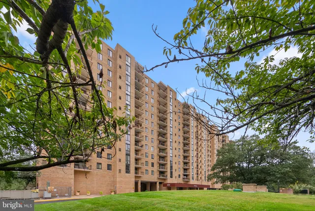 a view of building with yard