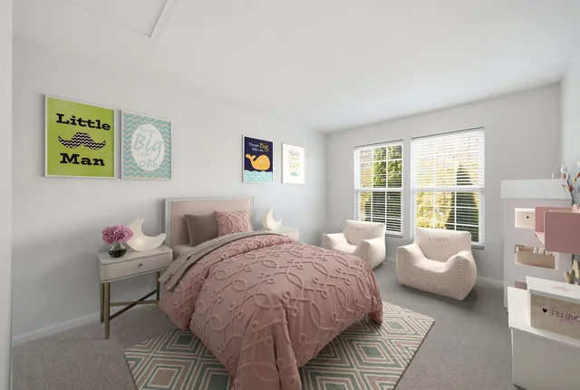 a bedroom with a bed and furniture