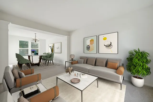 a living room with furniture a rug and a window