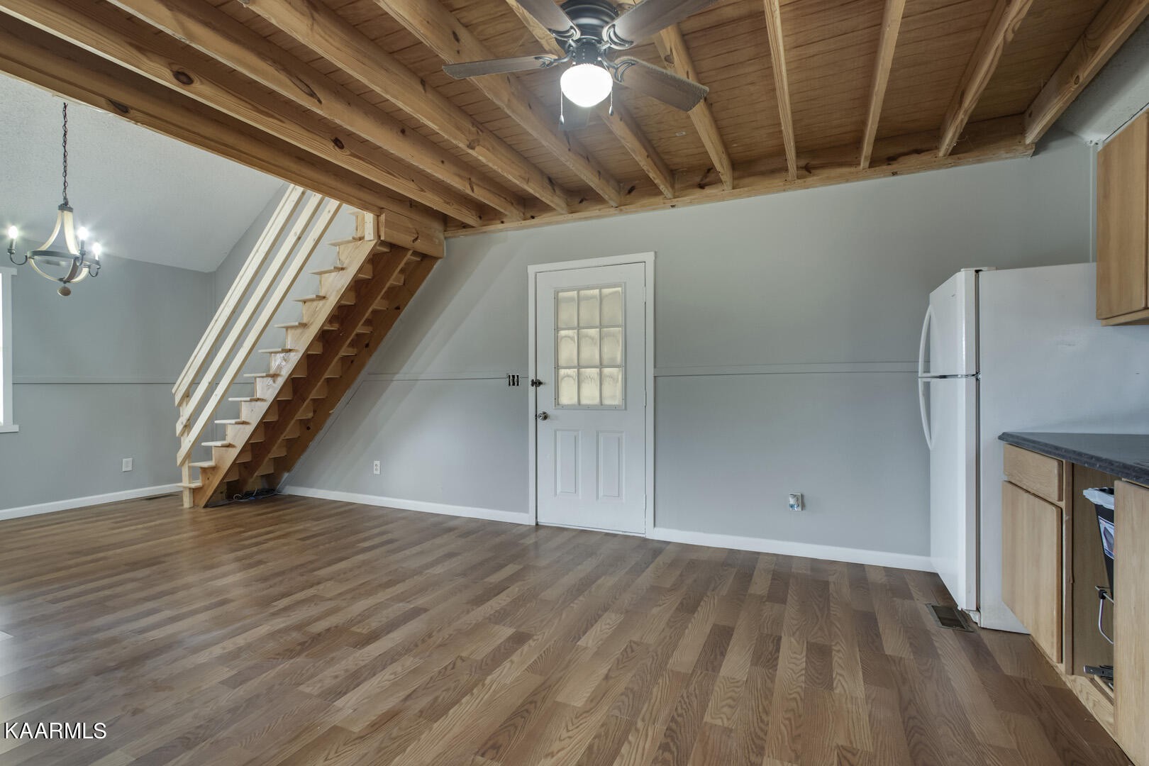 199 Honeysuckle Road Loudon, TN 37774 - Photo 11 of 33 a view of an empty room with wooden floor