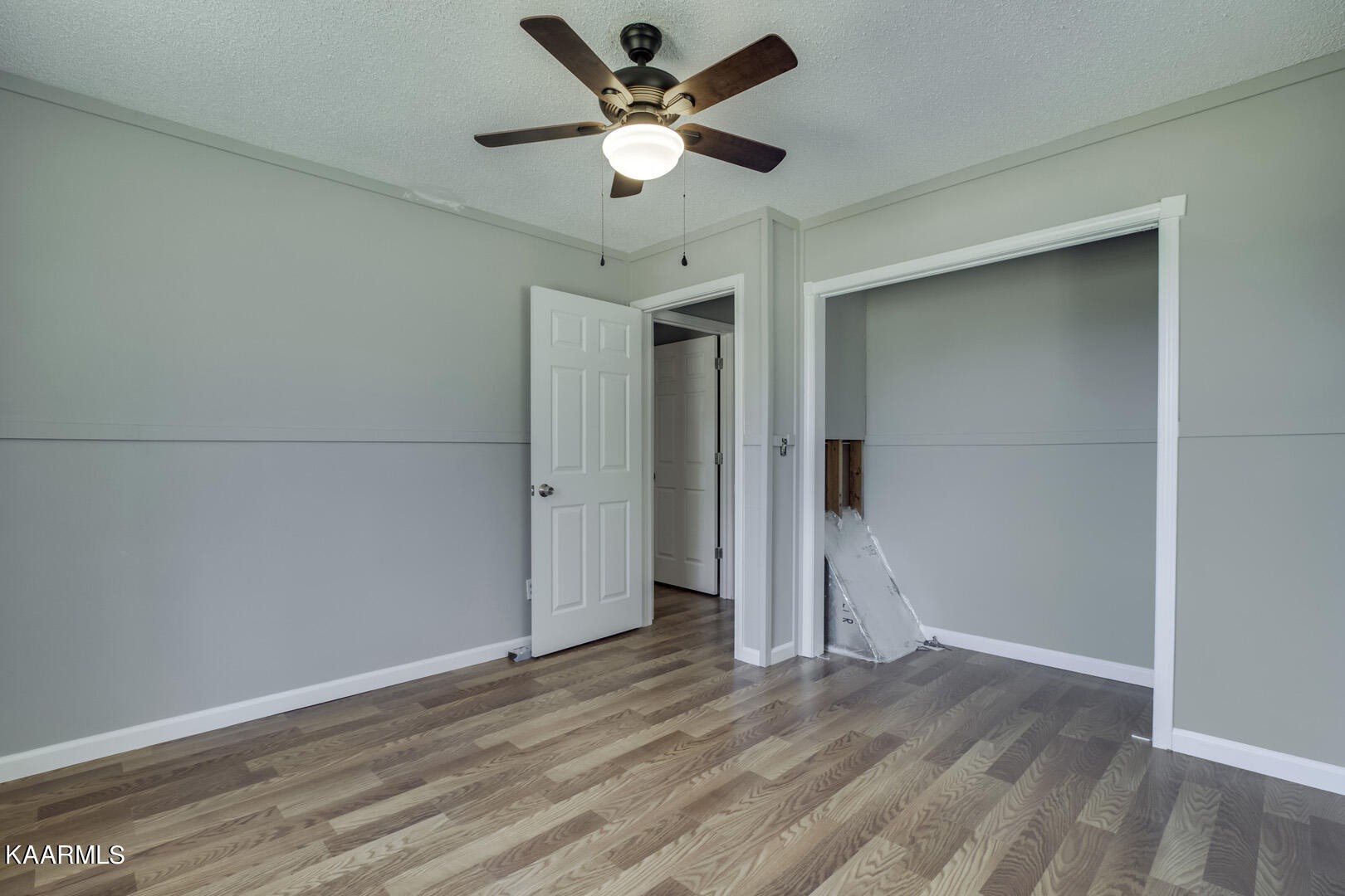 199 Honeysuckle Road Loudon, TN 37774 - Photo 21 of 33 wooden floor in an empty room