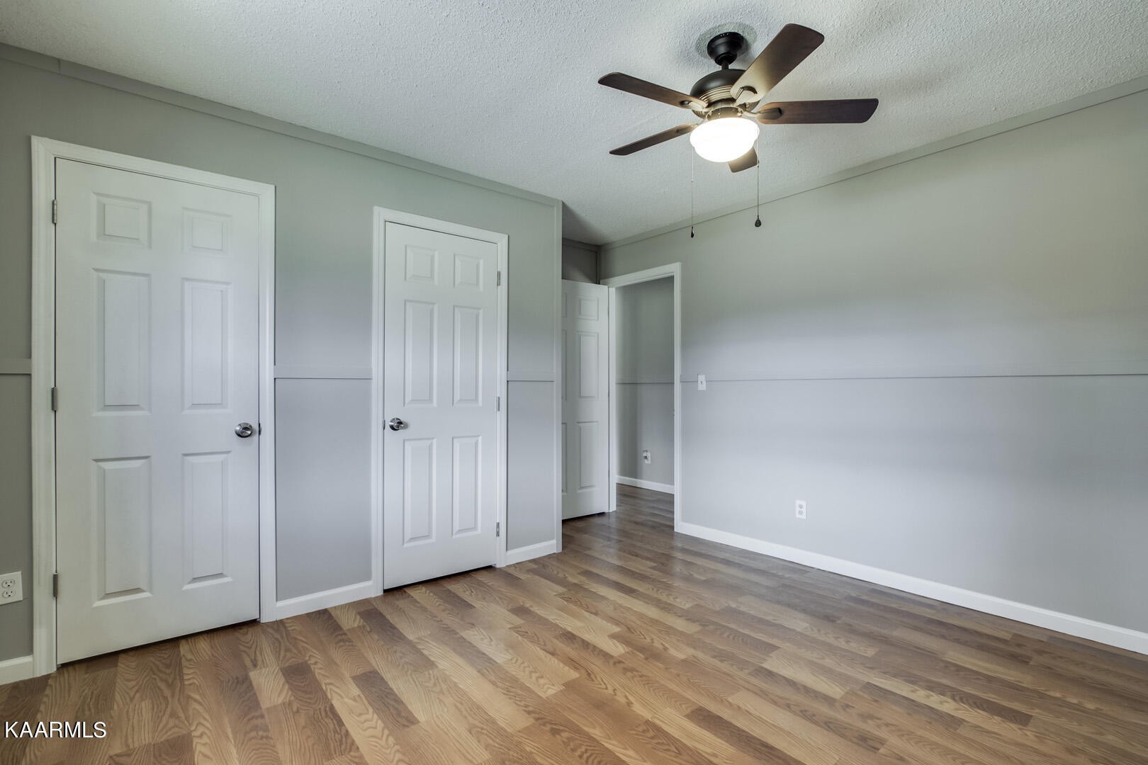 199 Honeysuckle Road Loudon, TN 37774 - Photo 23 of 33 an empty room with fan and a ceiling fan