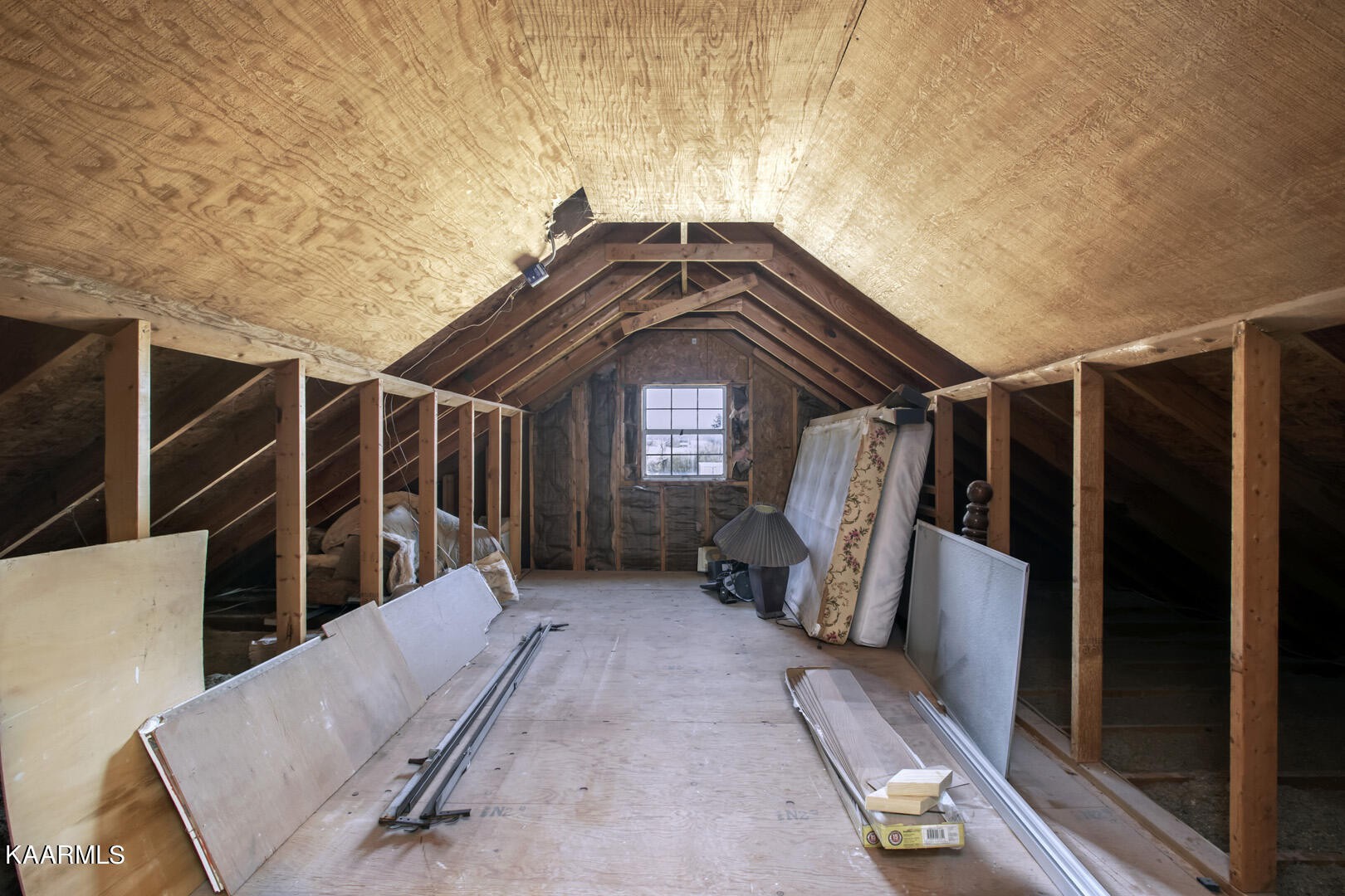 199 Honeysuckle Road Loudon, TN 37774 - Photo 27 of 33 a view of walk in closet with clothes and shoes
