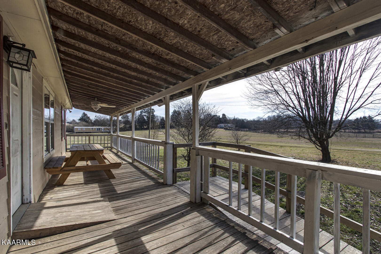 199 Honeysuckle Road Loudon, TN 37774 - Photo 3 of 33 a view of balcony with wooden floor