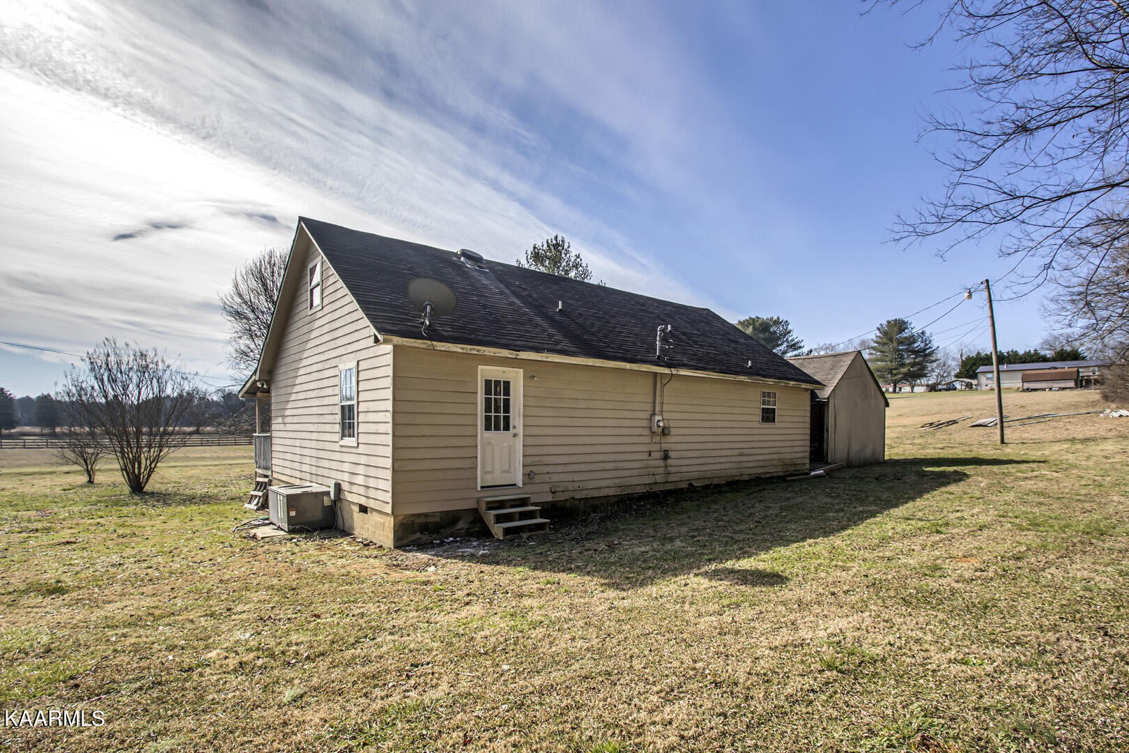 199 Honeysuckle Road Loudon, TN 37774 - Photo 32 of 33 a view of a house with a snow in the yard