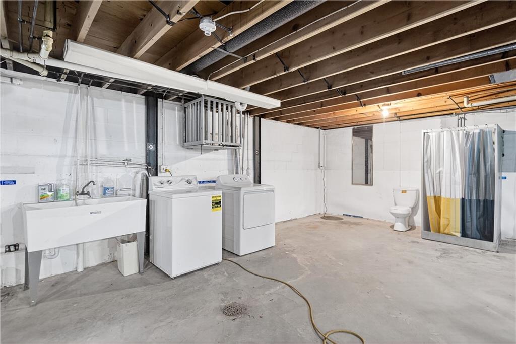 627 Wayne Avenue Monaca, PA 15061 - Photo 16 of 18 a view of storage and utility room with washer and dryer
