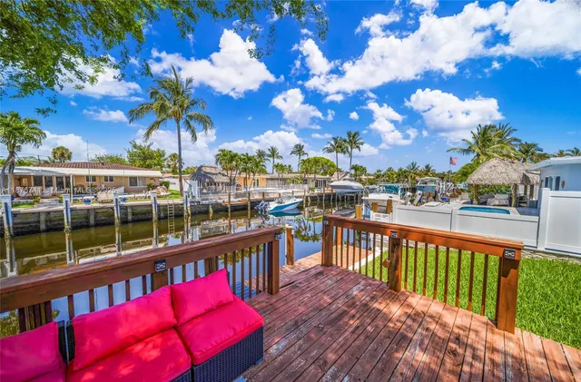 a view of a swimming pool with a patio
