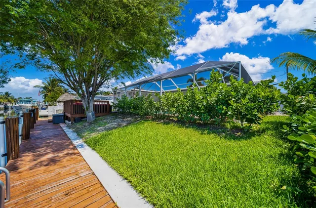 a view of a house with a swimming pool