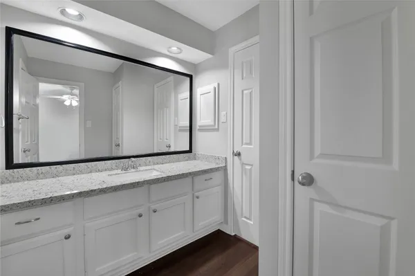 a bathroom with a toilet and a bathtub