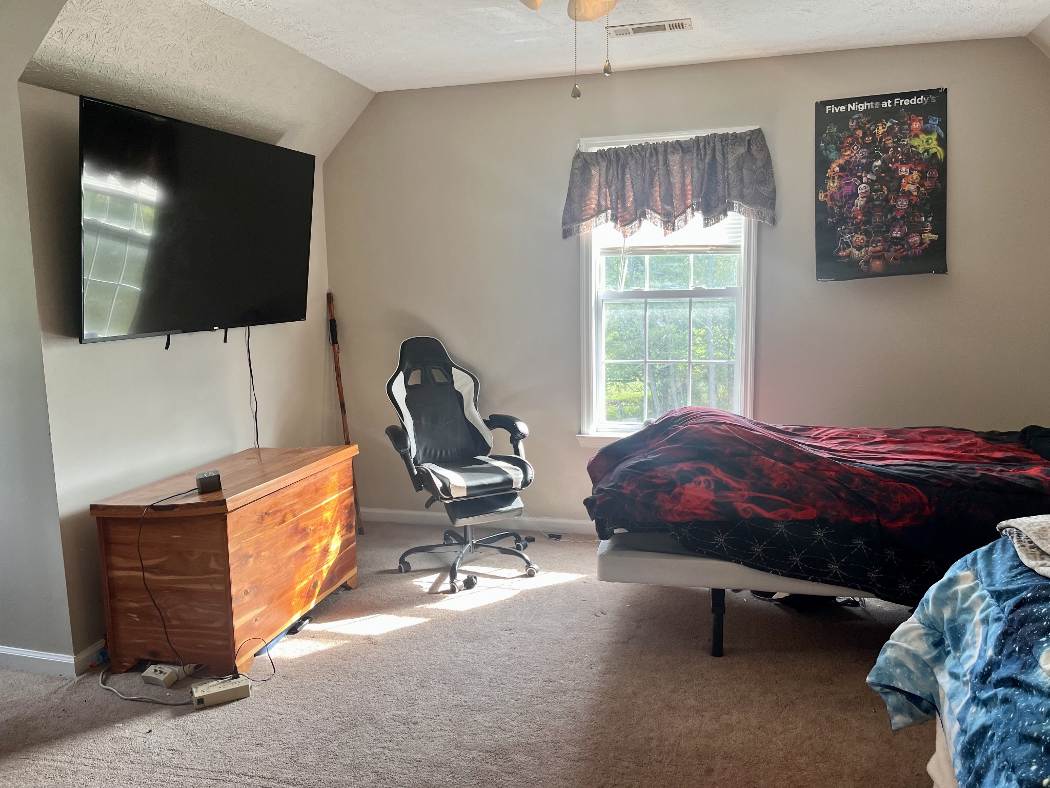 4038 Mt Zion Road Morrison, TN 37357 - Photo 12 of 38 a bedroom with a bed and a flat screen tv