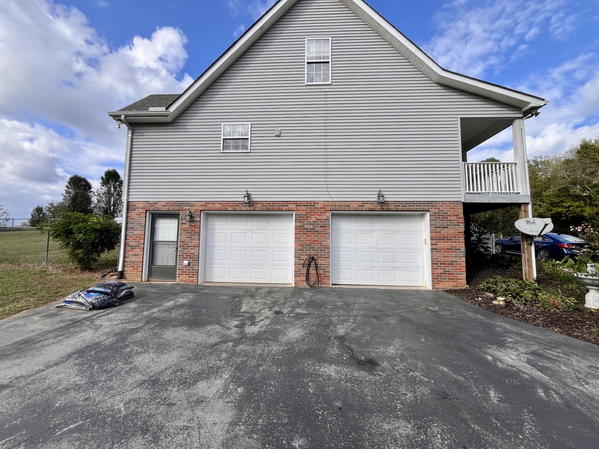 4038 Mt Zion Road Morrison, TN 37357 - Photo 21 of 38 a front view of a house with garage