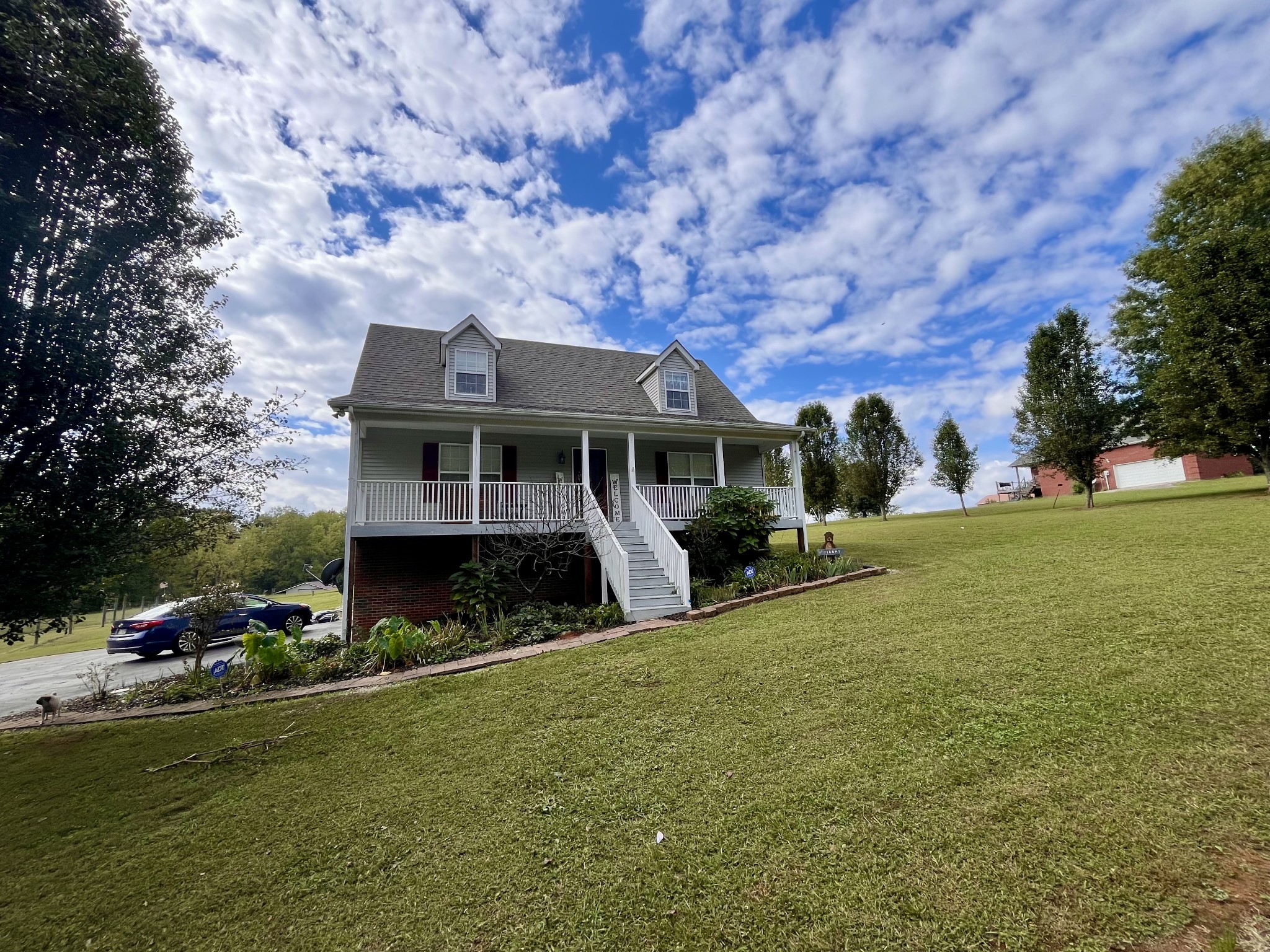 4038 Mt Zion Road Morrison, TN 37357 - Photo 24 of 38 a front view of a house with a yard