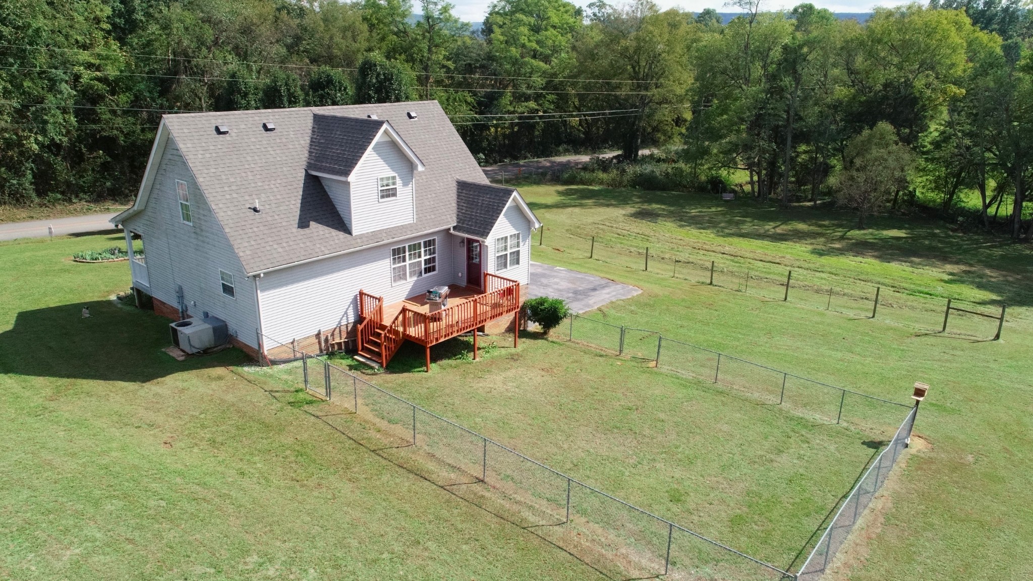 4038 Mt Zion Road Morrison, TN 37357 - Photo 33 of 38 a view of a backyard with chairs and a patio
