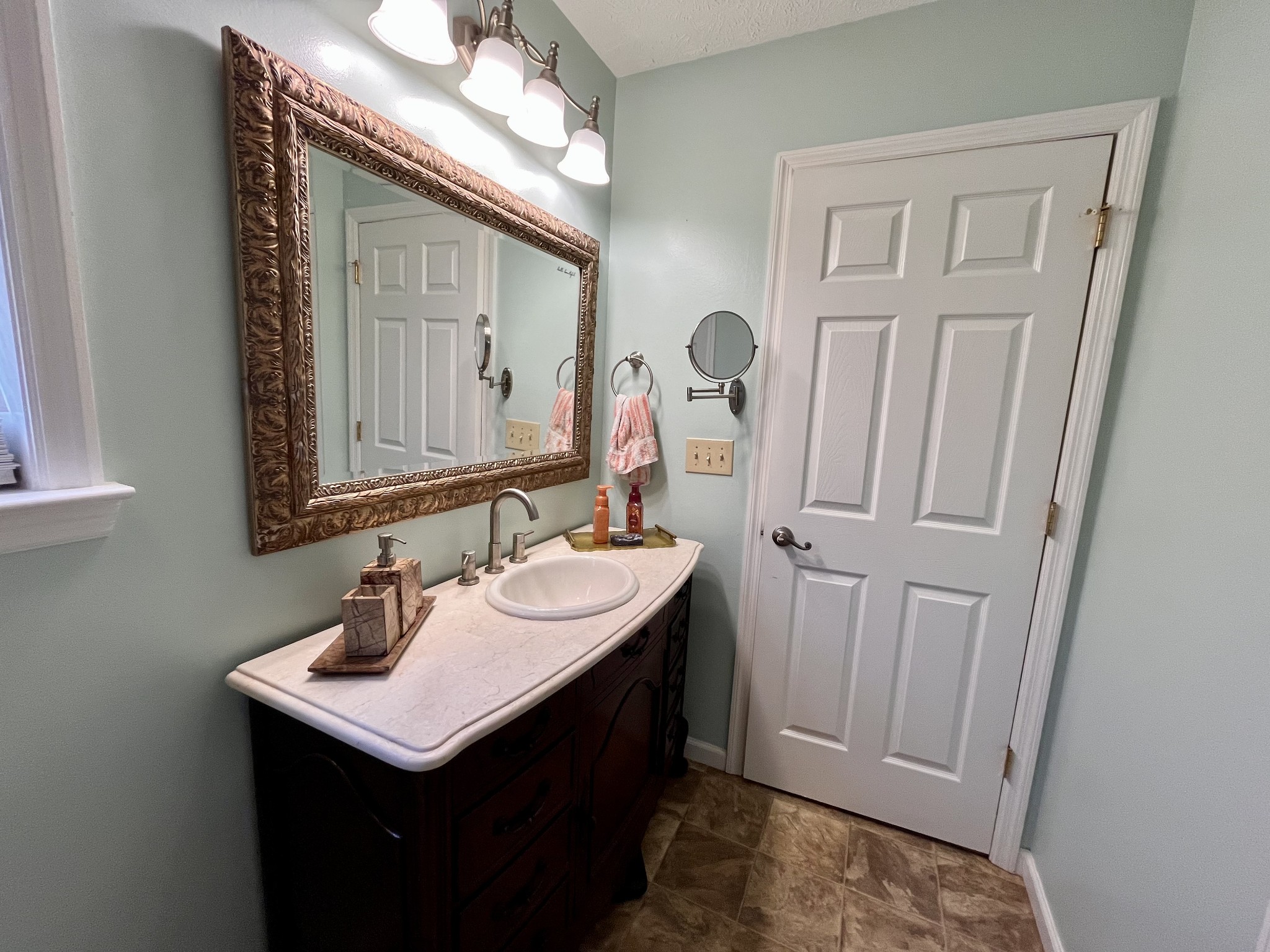 4038 Mt Zion Road Morrison, TN 37357 - Photo 10 of 38 a bathroom with a sink and a mirror