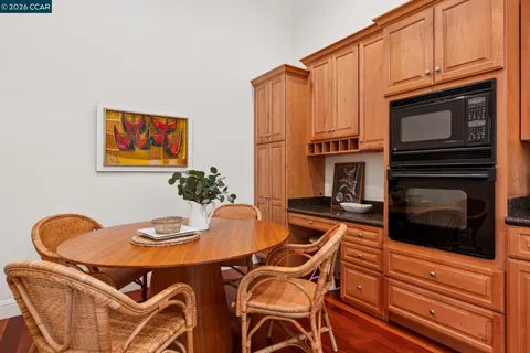 a living room with furniture fireplace and window