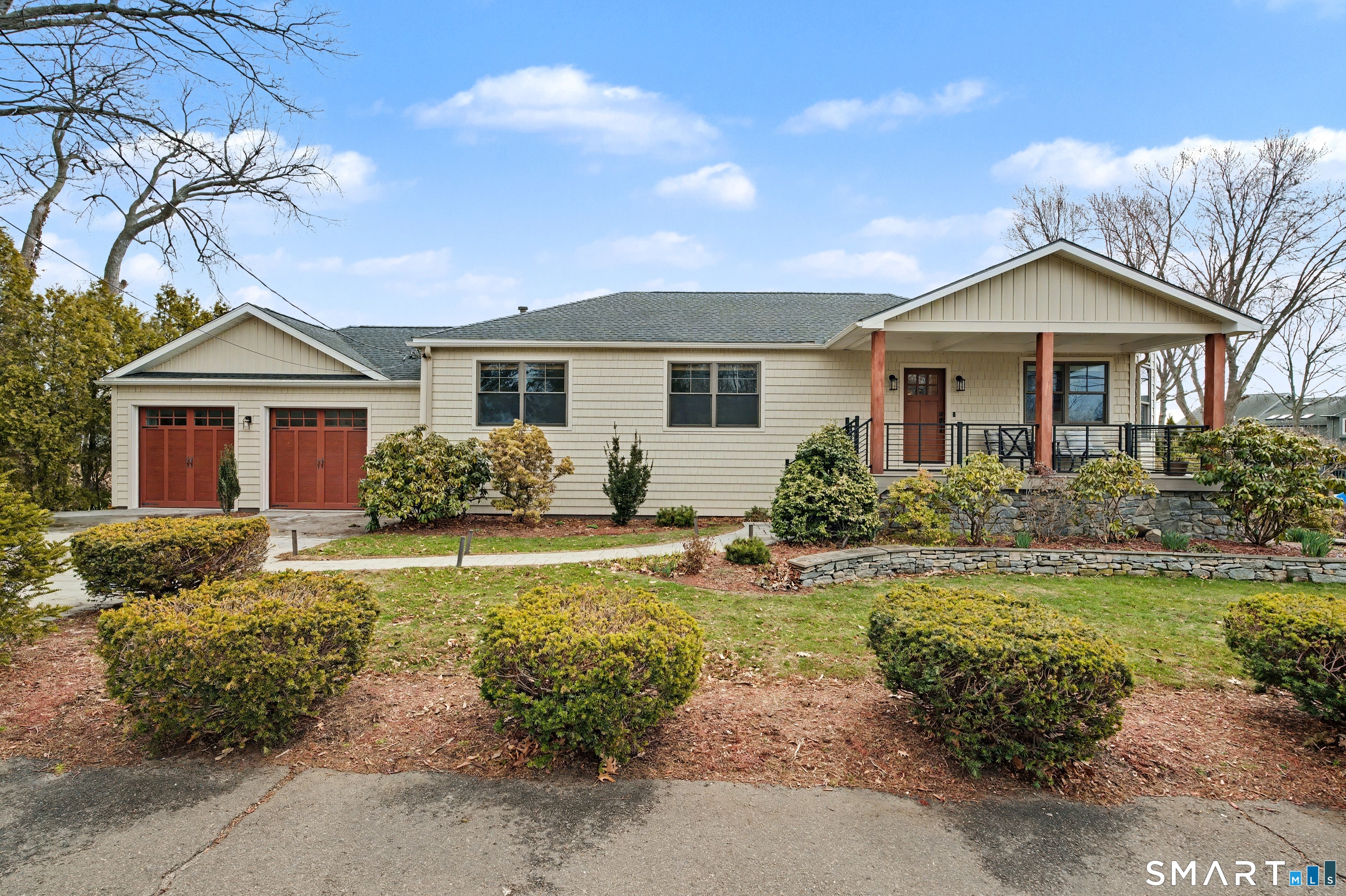 25 Harbor Street Branford, CT 06405 - Photo 1 of 34 a front view of a house with a garden