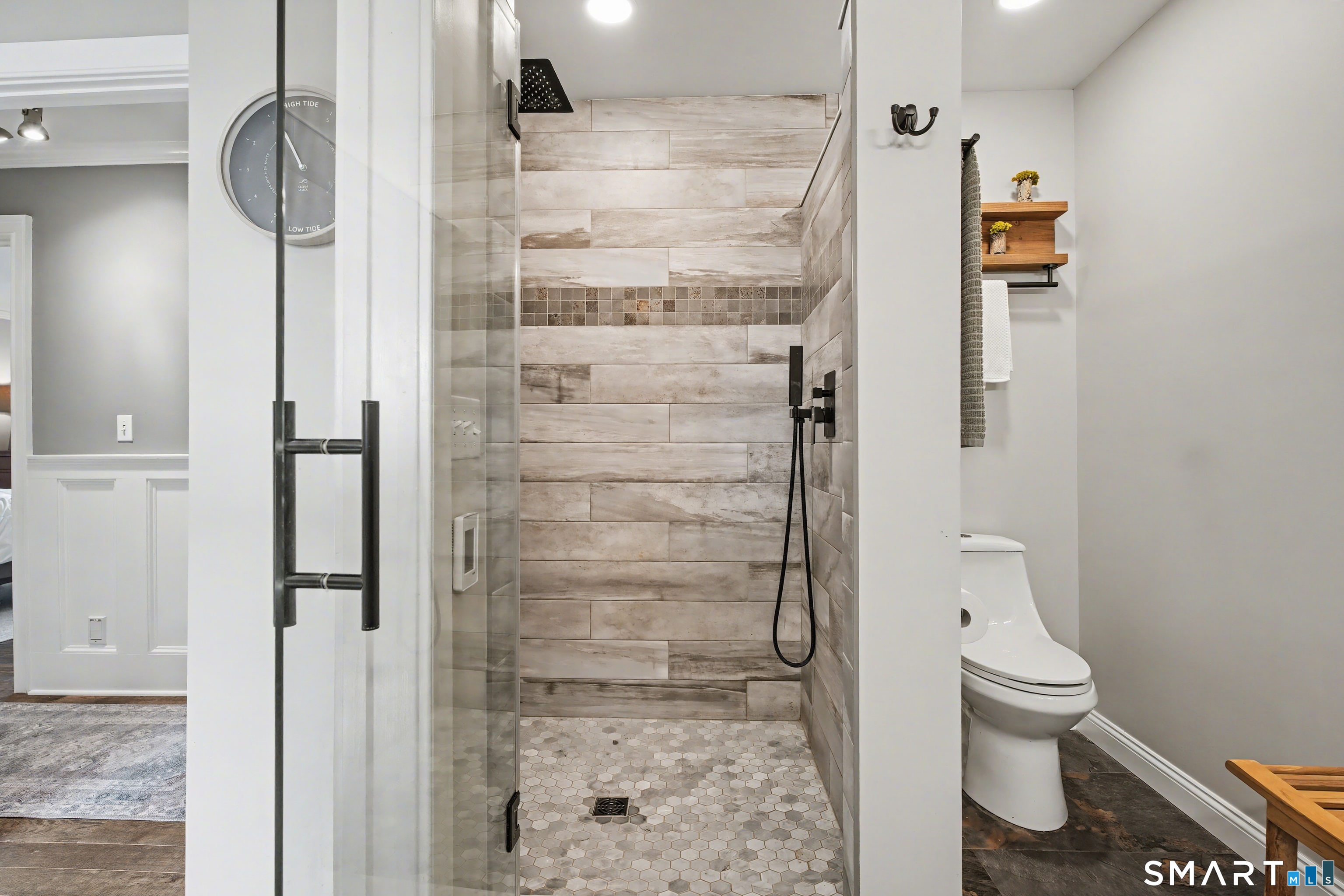 25 Harbor Street Branford, CT 06405 - Photo 18 of 34 a bathroom with a toilet and a shower