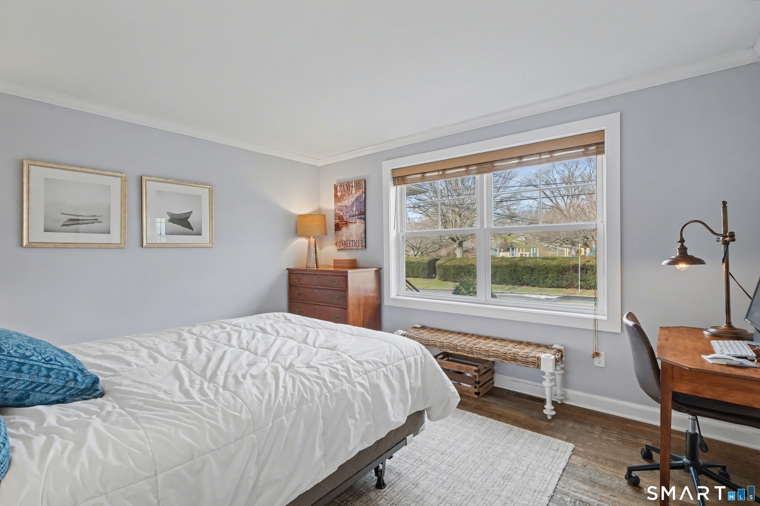 25 Harbor Street Branford, CT 06405 - Photo 19 of 34 a bedroom with a bed and a window