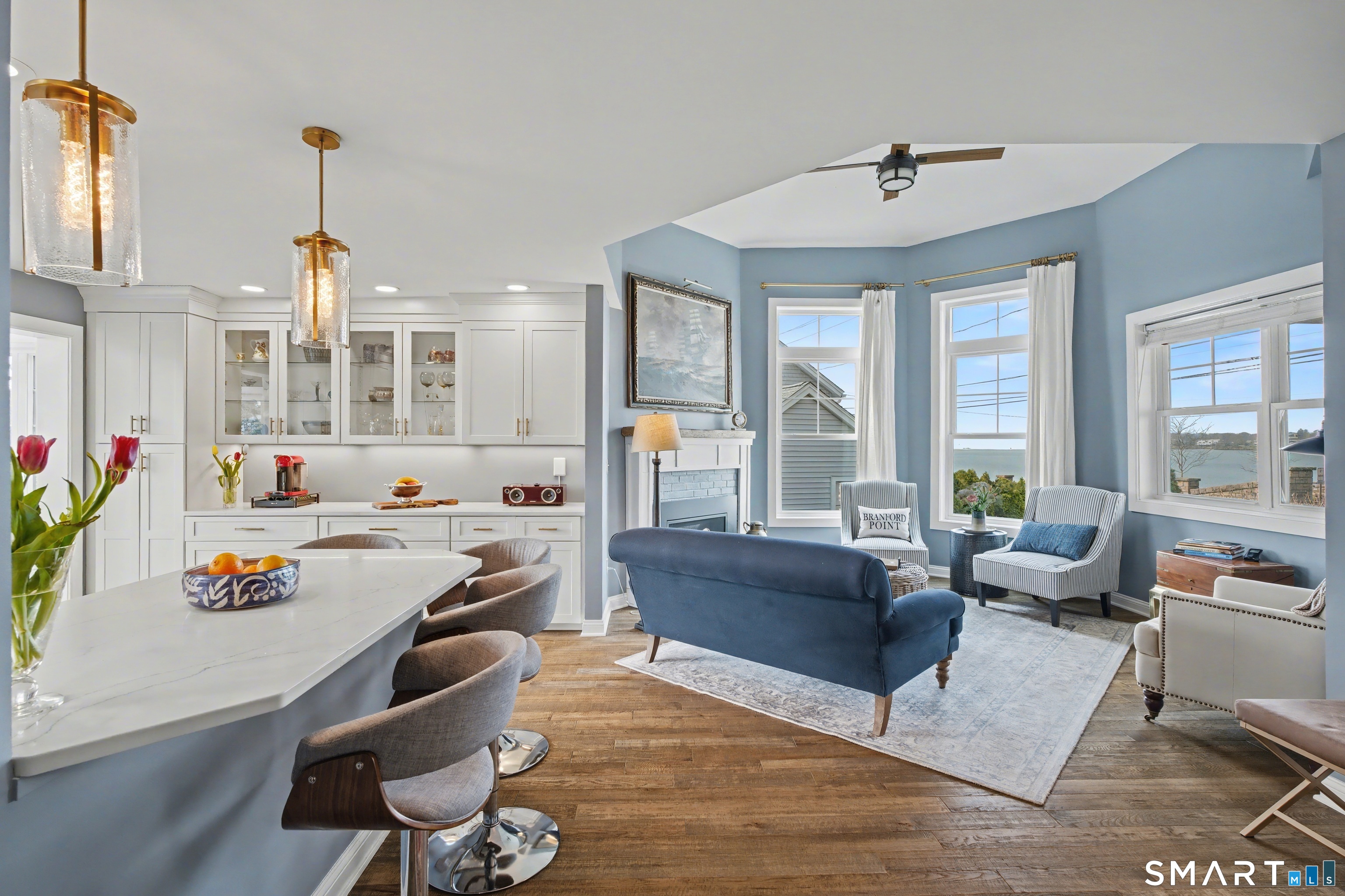 25 Harbor Street Branford, CT 06405 - Photo 4 of 34 a living room with furniture and a large window
