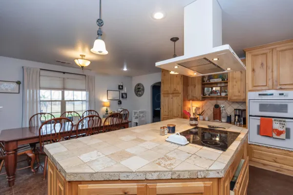a view of a dining room with furniture
