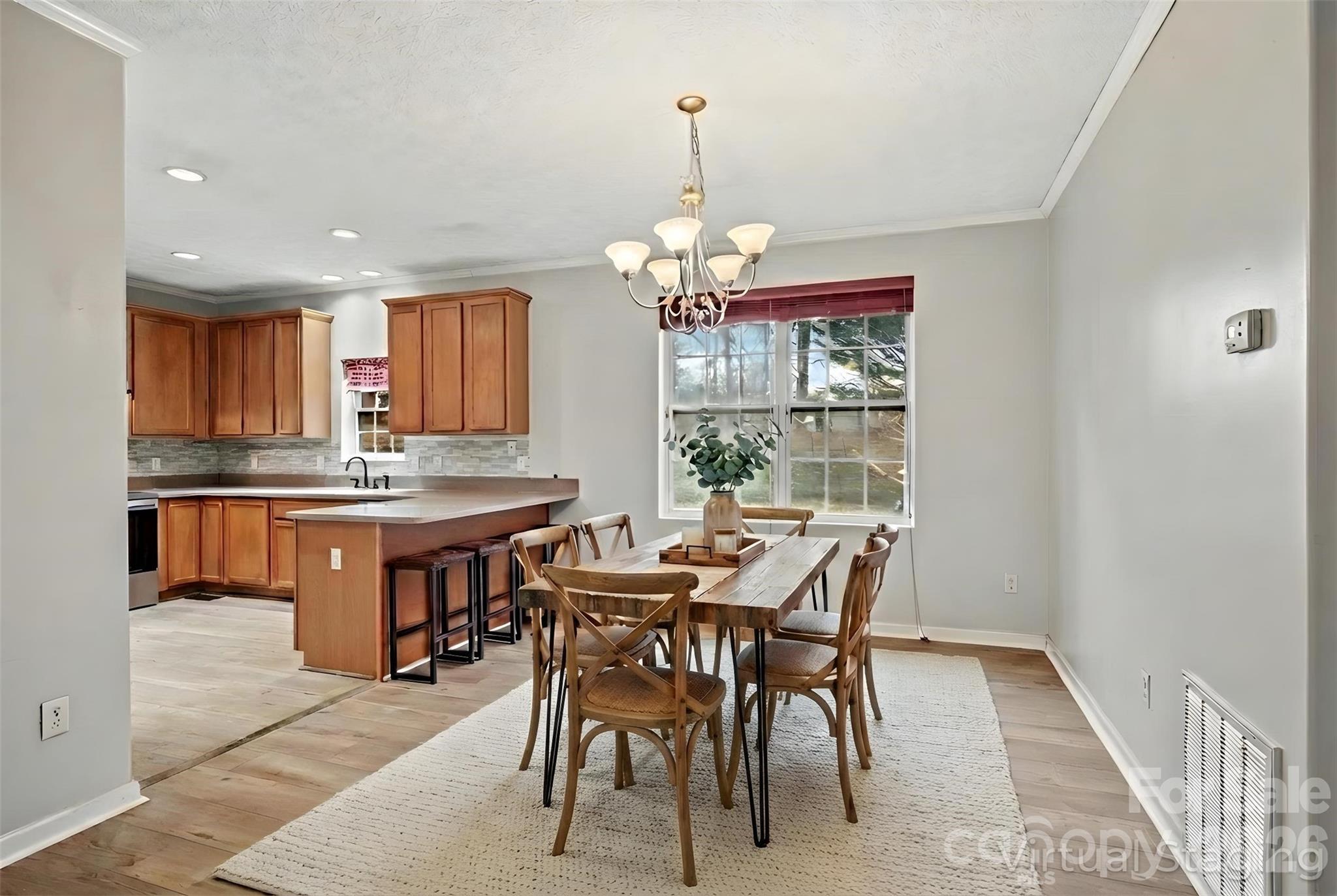 60 Maple Ridge Drive Old Fort, NC 28762 - Photo 12 of 42 a dining room with granite countertop furniture and window