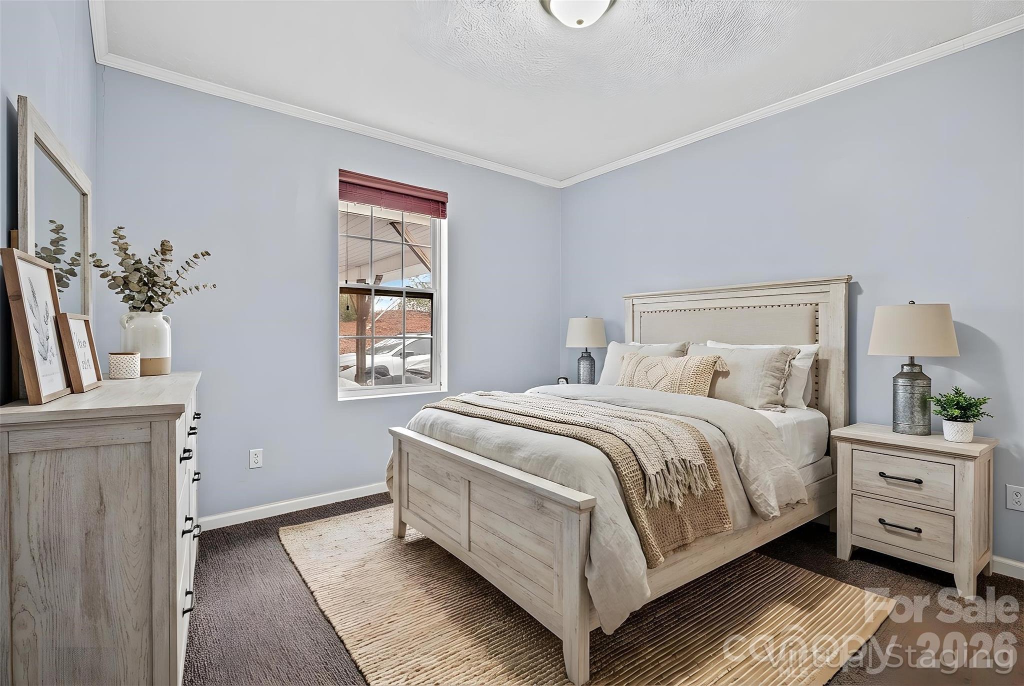 60 Maple Ridge Drive Old Fort, NC 28762 - Photo 18 of 42 a bedroom with a bed and a window