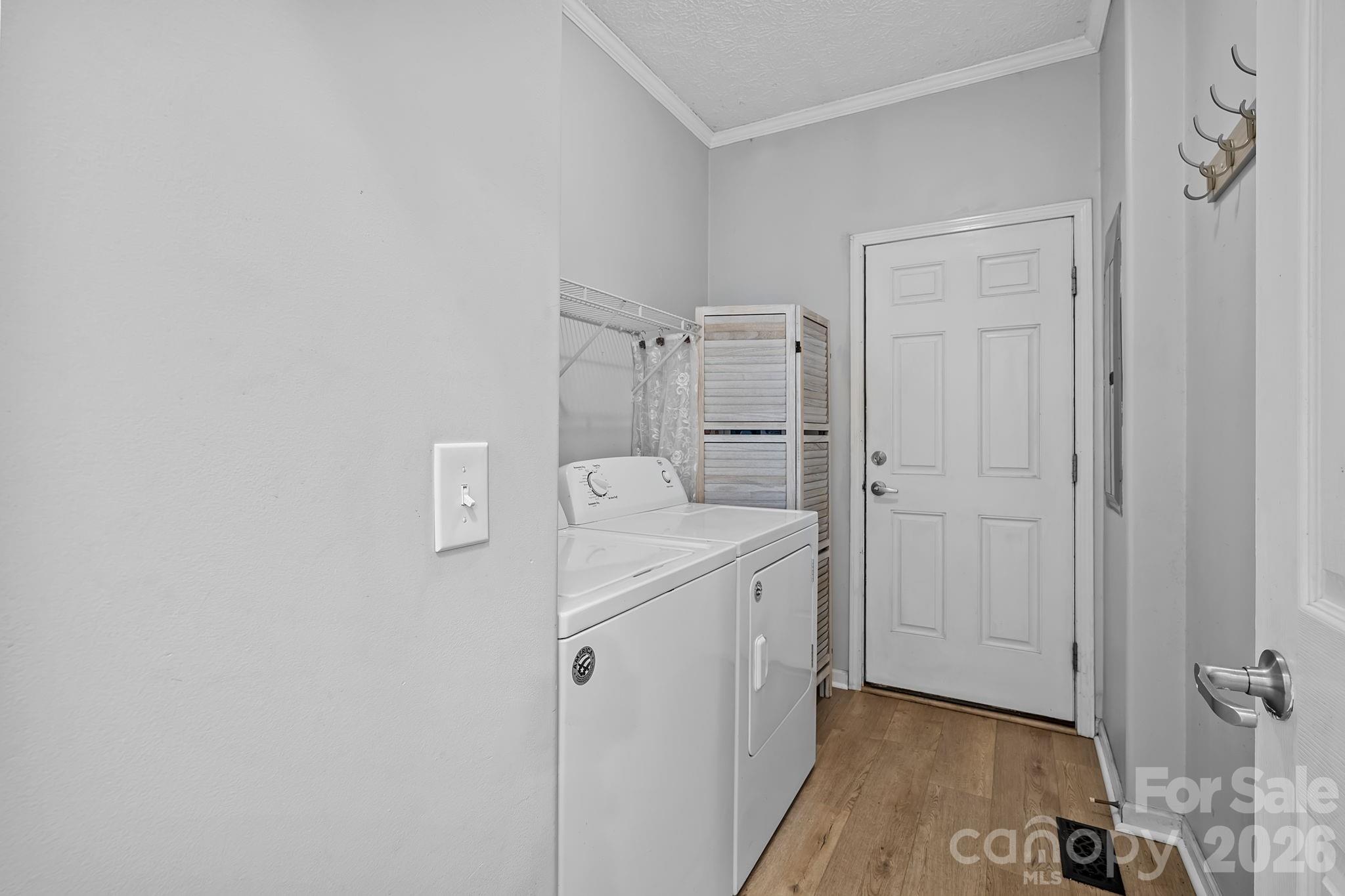 60 Maple Ridge Drive Old Fort, NC 28762 - Photo 23 of 42 a utility room with cabinets washer and dryer