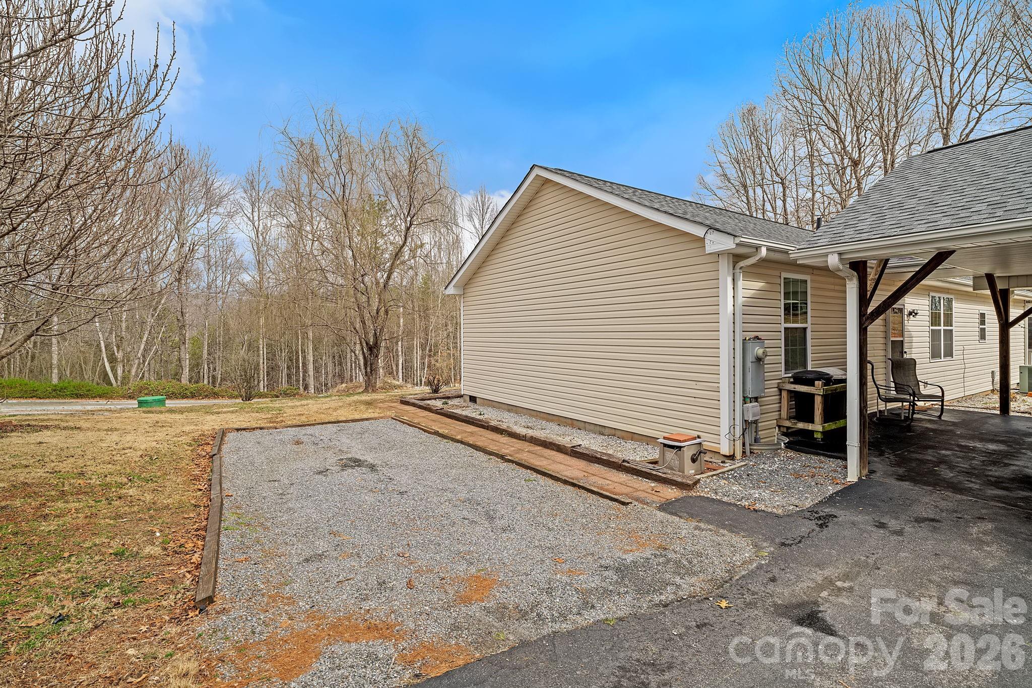 60 Maple Ridge Drive Old Fort, NC 28762 - Photo 28 of 42 a view of a house with a yard