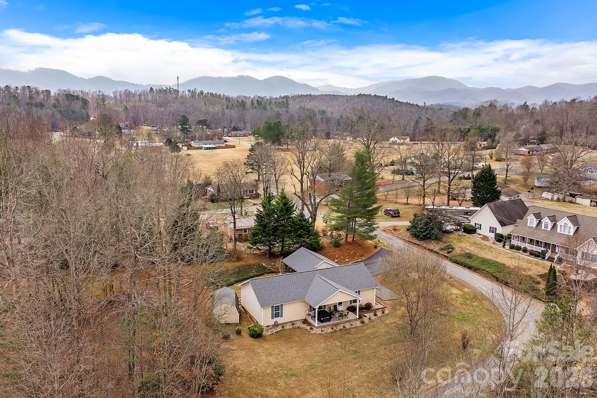60 Maple Ridge Drive Old Fort, NC 28762 - Photo 31 of 42 a view of a backyard with sitting area
