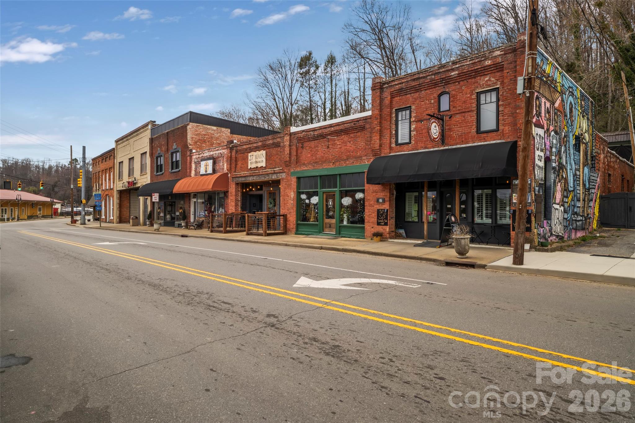 60 Maple Ridge Drive Old Fort, NC 28762 - Photo 36 of 42 a view of street with shops on a road