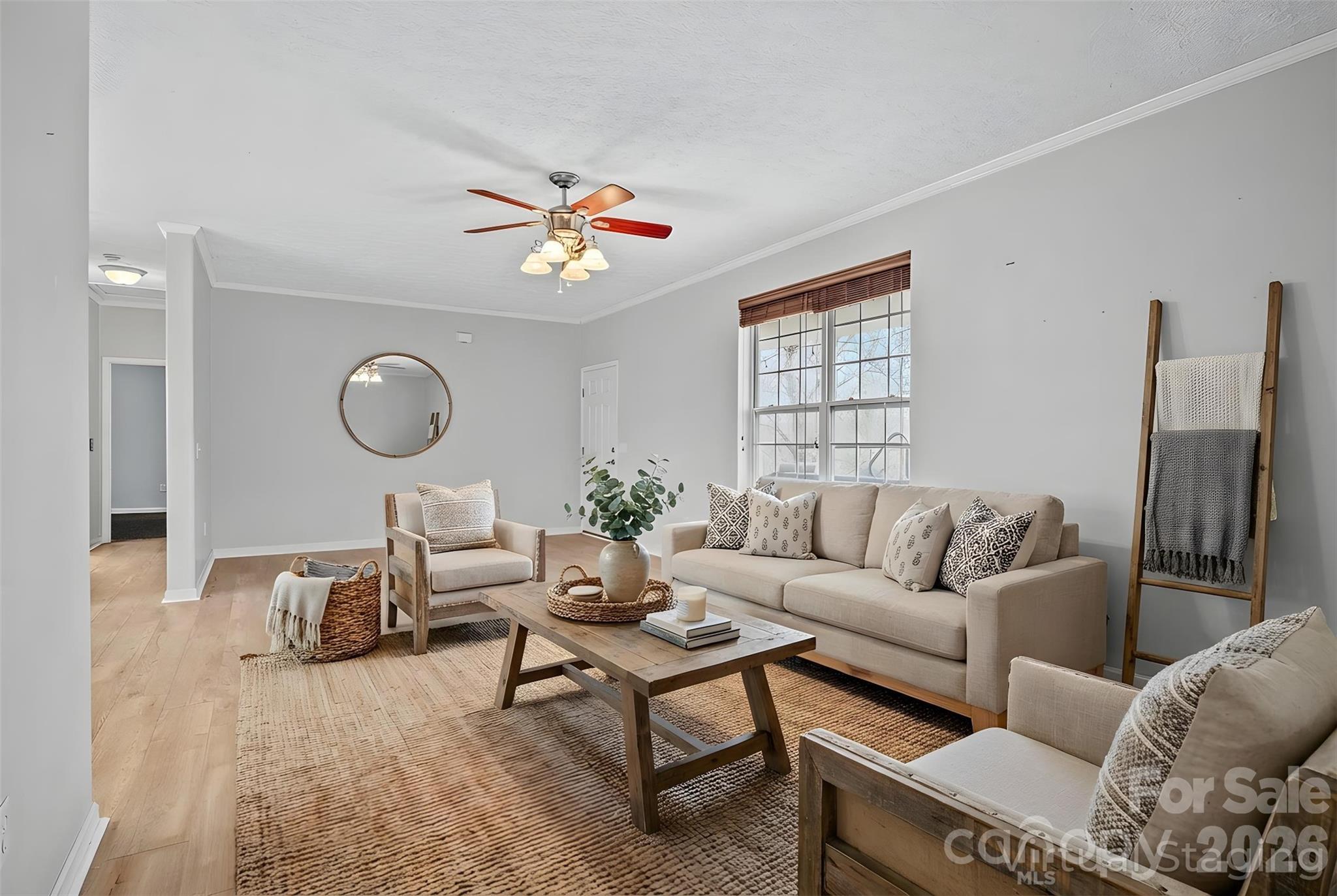 60 Maple Ridge Drive Old Fort, NC 28762 - Photo 5 of 42 a living room with furniture a rug and a window